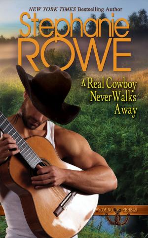 Cover of the book A Real Cowboy Never Walks Away (Wyoming Rebels, #4) by Juli Valenti