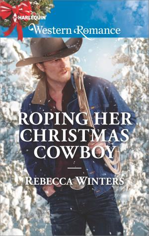 Cover of the book Roping Her Christmas Cowboy by Sharon Kendrick