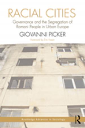 Cover of the book Racial Cities by Howard J Sherman, E. K. Hunt, Reynold F. Nesiba, Phillip O'Hara, Barbara A. Wiens-Tuers