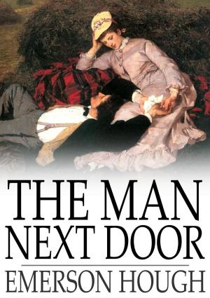 Book cover of The Man Next Door