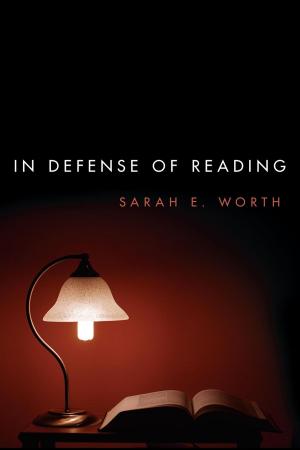 Cover of the book In Defense of Reading by Martin McQuillan, Joanna Callaghan