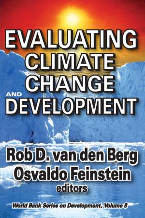 Cover of the book Evaluating Climate Change and Development by Adrienne E Gavin, Carolyn W de la L Oulton, SueAnn Schatz, Vybarr Cregan-Reid