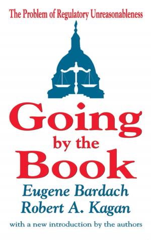 Cover of the book Going by the Book by Henry A. Giroux