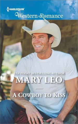 Cover of the book A Cowboy to Kiss by Emilie Rose, Kimberly Van Meter, Vicki Essex