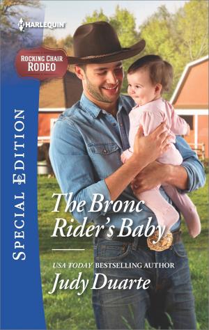 Cover of the book The Bronc Rider's Baby by Susan Krinard, Barbara J. Hancock