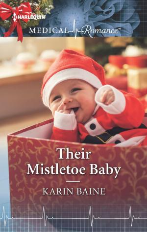 Cover of the book Their Mistletoe Baby by Cathy Williams