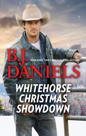 Cover of the book Whitehorse Christmas Showdown by Joan Elliott Pickart
