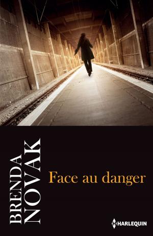 Cover of the book Face au danger by Sandra Marton