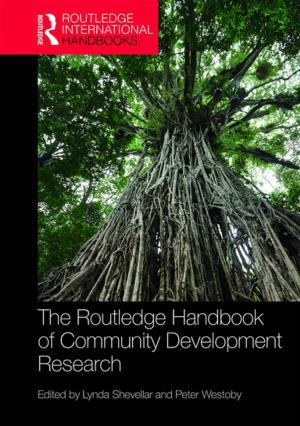 Cover of the book The Routledge Handbook of Community Development Research by Ming K. Chan, Gerard A. Postiglione, Ming K. Chan
