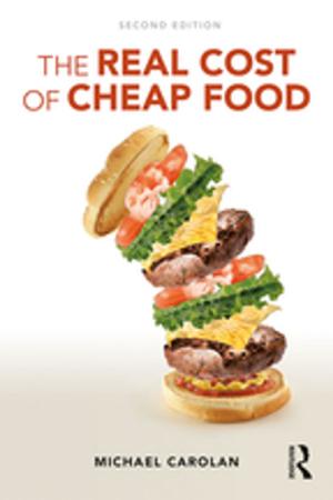 Cover of the book The Real Cost of Cheap Food by Richard K. Larson