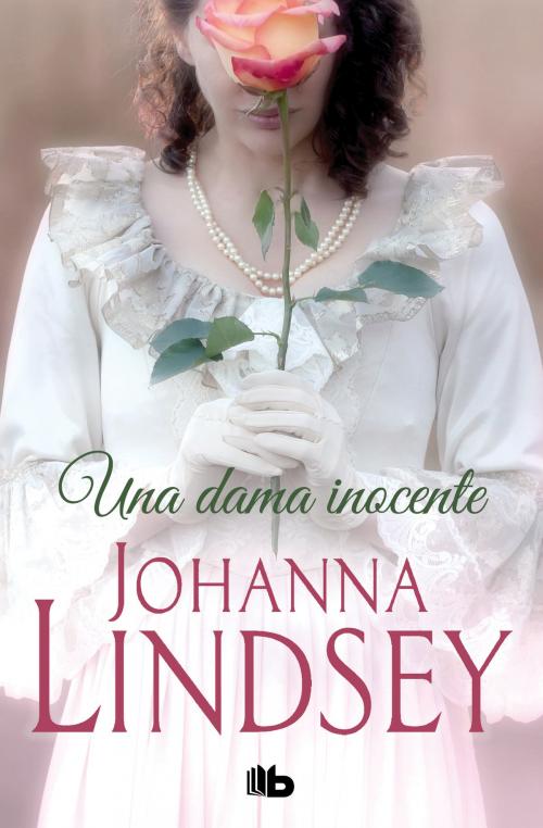Cover of the book Una dama inocente (Familia Reid 3) by Johanna Lindsey, Penguin Random House Grupo Editorial España
