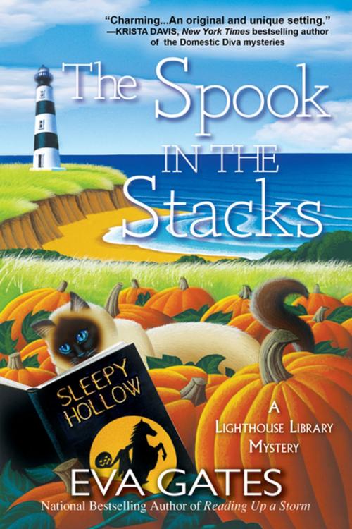 Cover of the book The Spook in the Stacks by Eva Gates, Crooked Lane Books