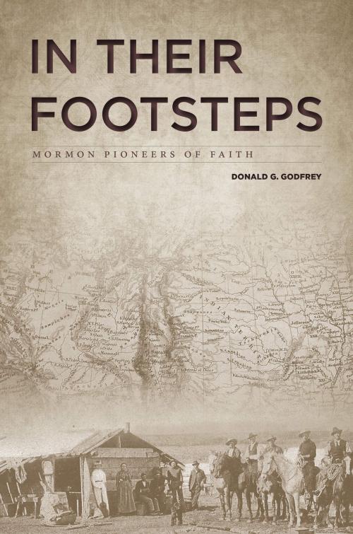 Cover of the book In Their Footsteps by Donald G. Godfrey, Deseret Book Company
