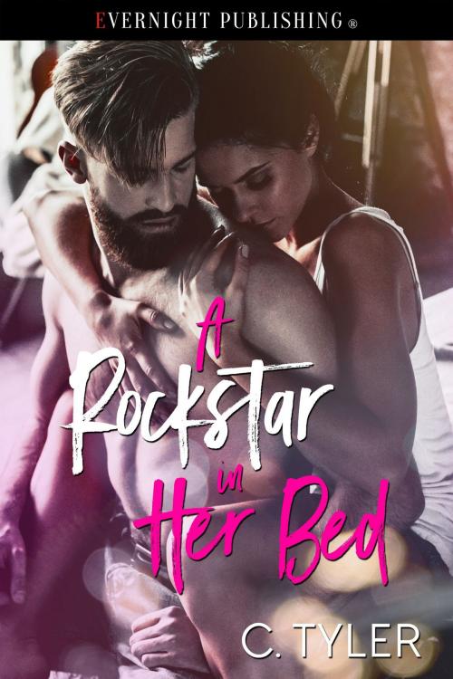 Cover of the book A Rockstar in Her Bed by C. Tyler, Evernight Publishing