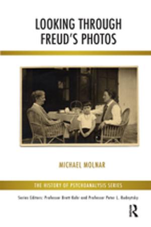 Cover of the book Looking Through Freud's Photos by Edwin D. Freed