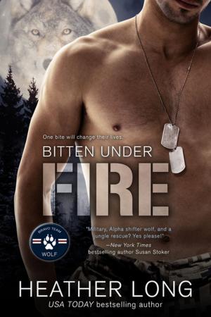 Cover of the book Bitten Under Fire by Nephy Hart