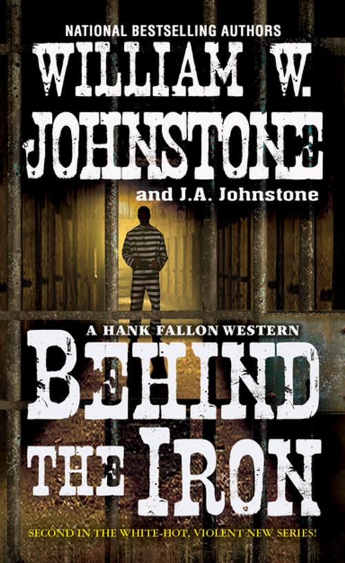 Cover of the book Behind the Iron by William W. Johnstone, J.A. Johnstone, Pinnacle Books