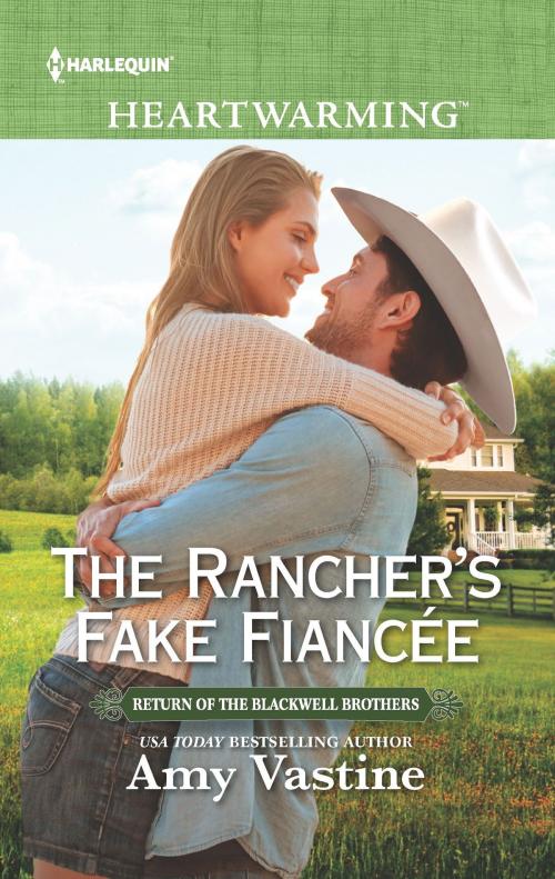 Cover of the book The Rancher's Fake Fiancée by Amy Vastine, Harlequin