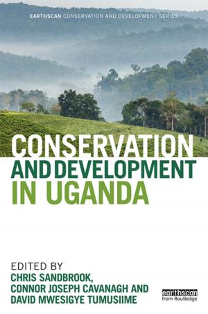 Cover of the book Conservation and Development in Uganda by Michael Uva