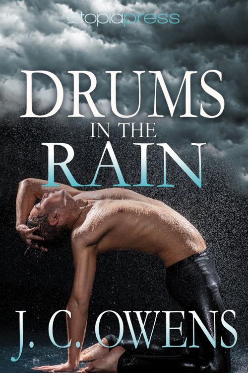 Cover of the book Drums in the Rain by J. C. Owens, Etopia Press