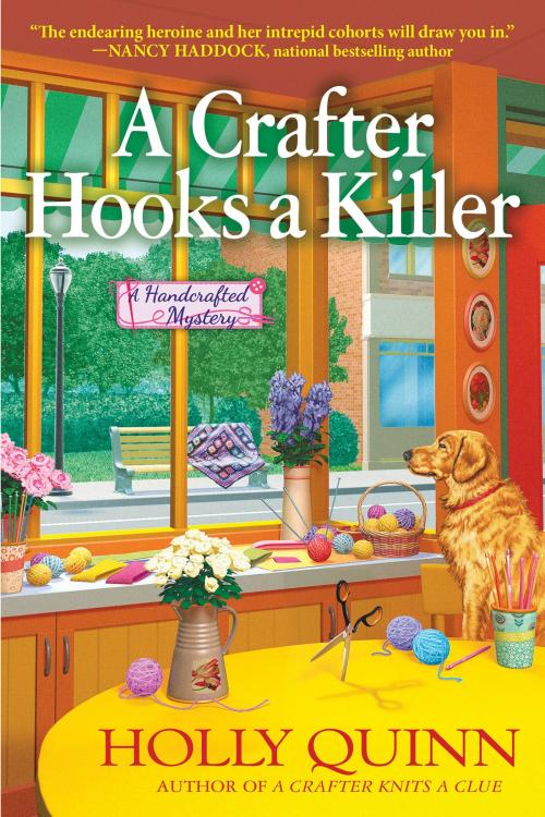 Cover of the book A Crafter Hooks a Killer by Holly Quinn, CROOKED LANE BOOKS