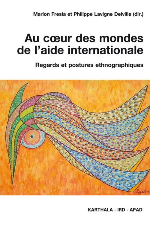 Cover of the book Au coeur des mondes de l'aide internationale by Collectif, IRD Éditions