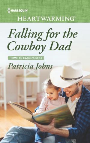 Cover of the book Falling for the Cowboy Dad by Lisa Hagerty