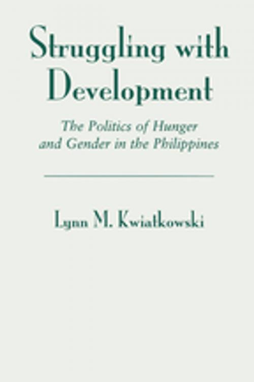Cover of the book Struggling With Development by Lynn Kwiatkowski, Taylor and Francis