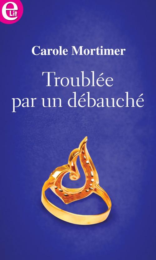 Cover of the book Troublée par un débauché by Carole Mortimer, Harlequin