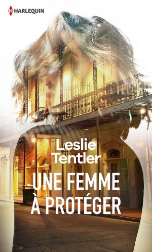 Cover of the book Une femme à protéger by Penny Jordan, Helen Brooks, Carol Wood