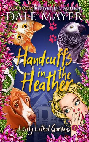Cover of the book Handcuffs in the Heather by Robyn Donald